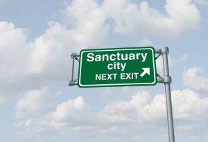 Sanctuary City road sign